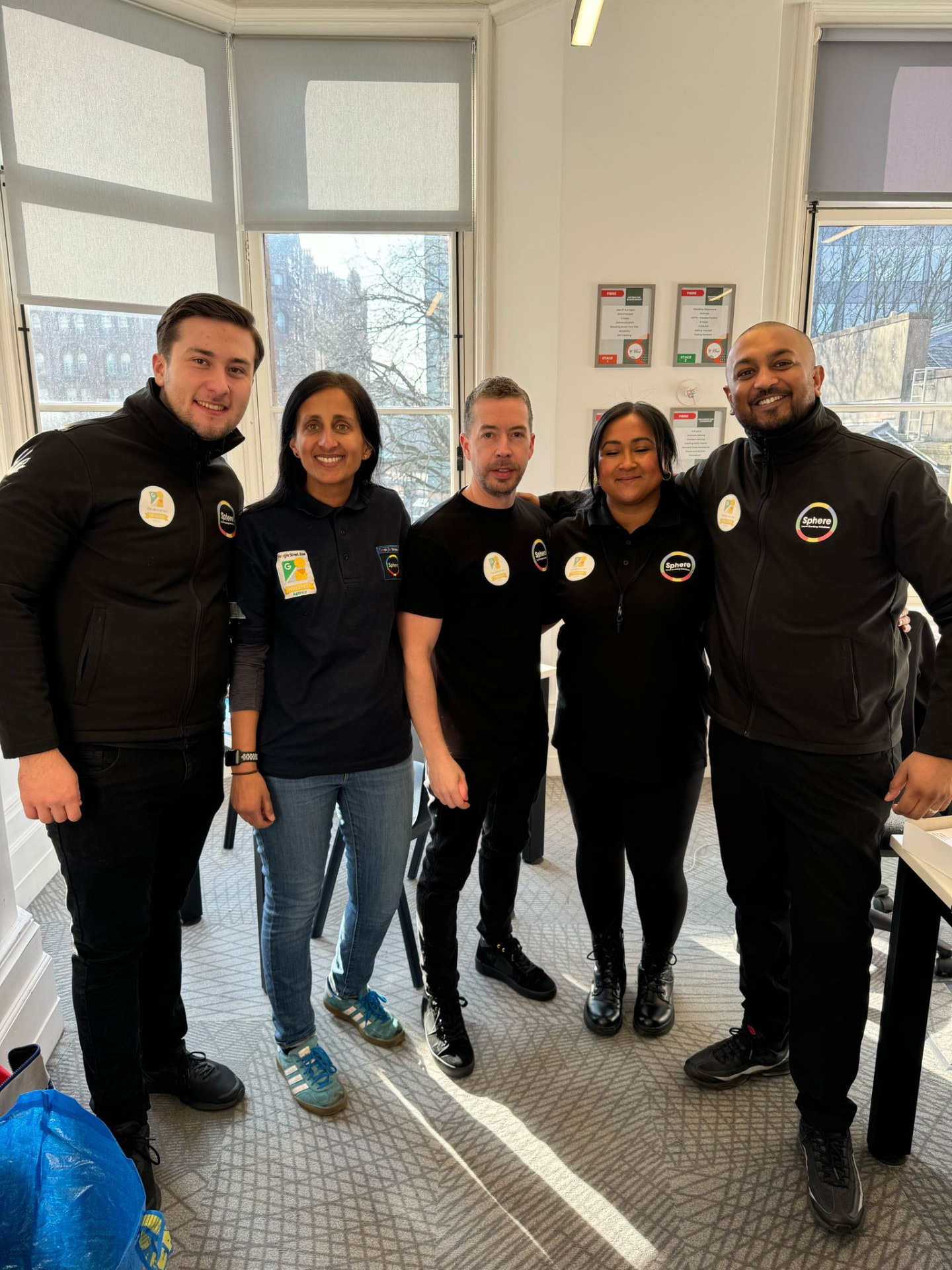 Five members of a face-to-face campaign team